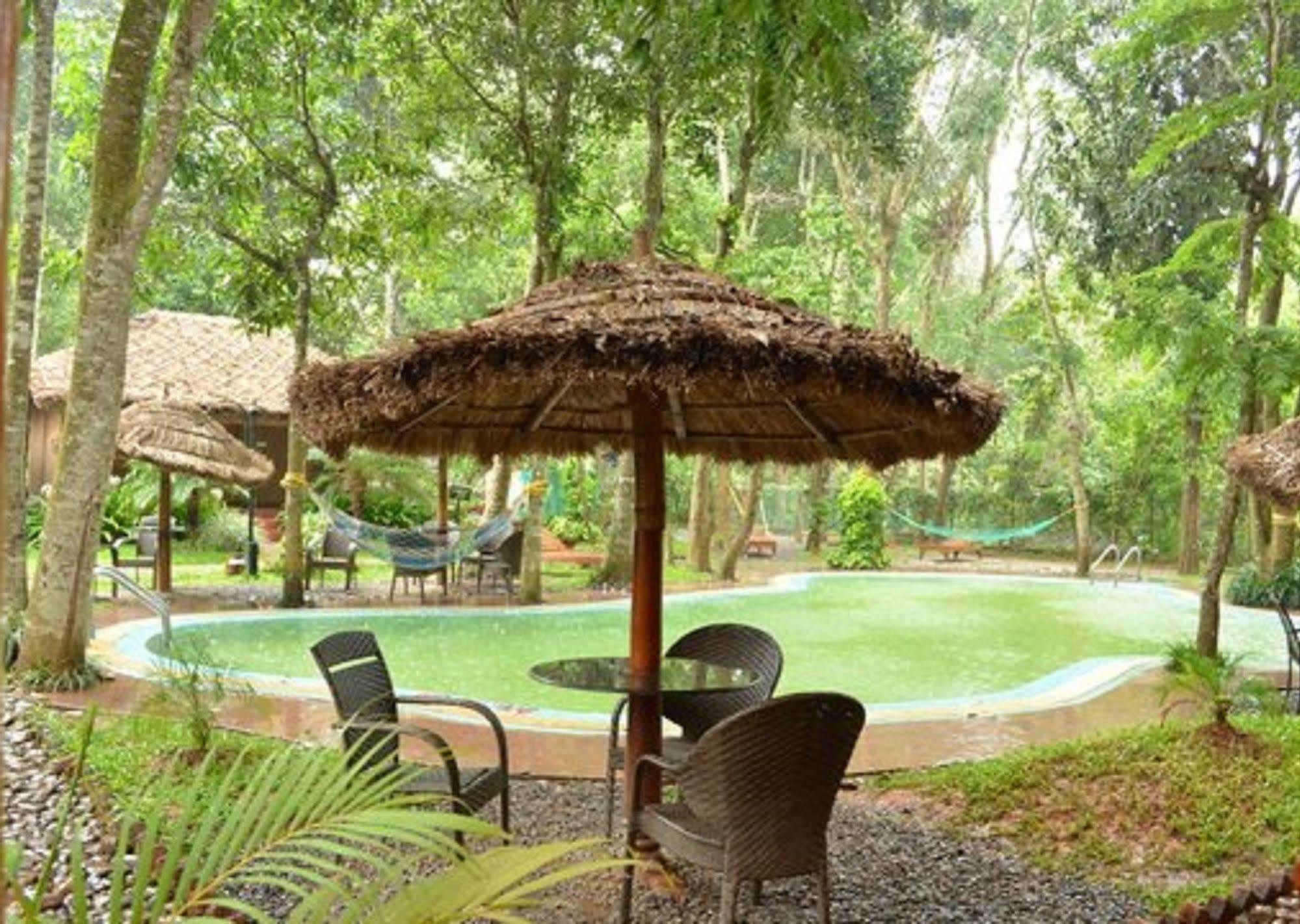 Woods N Spice - Thekkady Hotel Kumily Exterior photo